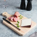 Choice 13 1/2" x 7 1/2" x 3/4" Medium Wooden Bread / Charcuterie Cutting Board with Knife Slot and Handle Main Thumbnail 5