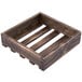 An American Metalcraft wooden crate with four slats.