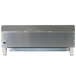 A stainless steel rectangular silver countertop gas hot plate with wheels.
