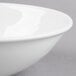 A close-up of a Libbey white porcelain bowl with a white rim.