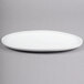 A white Libbey Aluma White porcelain oval tray with a small rim.