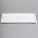 A white rectangular Libbey Aluma White porcelain tray.