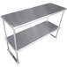 A stainless steel double deck overshelf from Advance Tabco above a table.