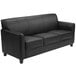 A black leather Flash Furniture Hercules Diplomat sofa with wooden legs.