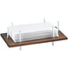 A Cal-Mil wooden and chrome napkin holder with white napkins on a table.