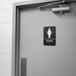 A black and white ADA sign for a women's restroom door.