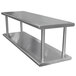 A stainless steel Pass-Through Shelf with two metal shelves on it.