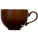 A close-up of a brown Tuxton Mahogany cappuccino cup with a handle.