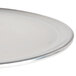 An American Metalcraft Heavy Weight Aluminum Coupe Pizza Pan. A close-up of a silver pizza pan.