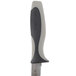A Dexter-Russell V-Lo scalloped utility knife with a black and grey handle.