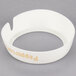 A white plastic collar with beige "Peppercorn" text.