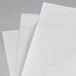 A stack of Choice white newsprint sandwich wrap paper.