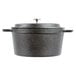 An American Metalcraft pre-seasoned black cast iron pot with a lid.