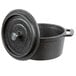 An American Metalcraft pre-seasoned cast iron pot with a lid.