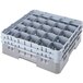 A grey plastic Cambro glass rack with 25 compartments and 4 extenders.