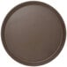 A round brown Cambro non-skid serving tray.
