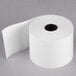 A white roll of Point Plus traditional cash register paper with a black end.