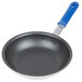 A Vollrath Wear-Ever aluminum non-stick fry pan with a blue handle.
