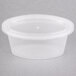 A clear plastic Pactiv Ellipso souffle container with a lid.