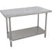 An Advance Tabco stainless steel work table with a stainless steel undershelf.