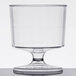 A clear plastic pedestal wine cup with a small base.