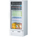 A Turbo Air white glass door refrigerator filled with bottles of beverages.
