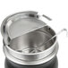 An APW Wyott stainless steel soup kettle with a ladle.