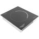 A black square induction cooker with a circular design.