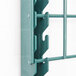 A Metroseal 3 wire grid in green metal with four holes.