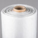 A roll of LK Packaging white plastic bun pan covers.