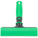 An Unger ErgoTec green and black scraper with a safety cap.
