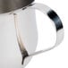 A Tablecraft stainless steel bell creamer with a handle.