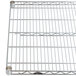 A Metro chrome wire shelf for a Super Erecta metal rack.