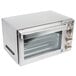 A silver Waring countertop convection oven with a glass door.