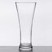 A clear customizable flared plastic pilsner glass with a rim.