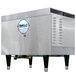 A Hubbell natural gas booster heater with a stainless steel water tank.