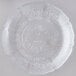 A Carlisle clear polycarbonate plate with a flower design.