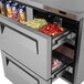 A Turbo Air stainless steel worktop refrigerator with one door and two drawers.