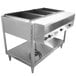 A Vollrath ServeWell electric hot food table with three pans on a counter.