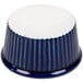 A blue and white fluted ramekin with a white circular surface.
