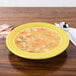 Fiesta® Dinnerware from Steelite International HL451320 Sunflower 13.25 oz. China Rim Soup Bowl - 12/Case Main Thumbnail 1