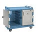 A slate blue and white plastic Cambro meal delivery cart with a door open.