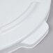 A white plastic lid for a Rubbermaid BRUTE 55 gallon trash can with a handle.