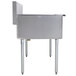 A large Advance Tabco stainless steel sink with legs.