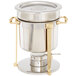 A Vollrath stainless steel soup chafer with brass trim and handles.