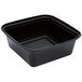 A black square Pactiv Newspring VERSAtainer container with a clear lid.