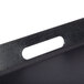 A close-up of a black plastic GET Room Service Tray with a non-skid surface.