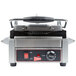 A Cecilware single panini sandwich grill with grooved metal surfaces and a red handle.