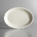 Choice 11 5/8" x 8 1/2" Ivory (American White) Scalloped Edge Oval Stoneware Platter - 12/Case Main Thumbnail 3