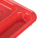 A red Carlisle polypropylene tray with six compartments.